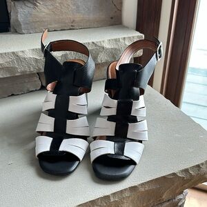 Black and white leather, H by Halston block heel sandals. Size 9.5
